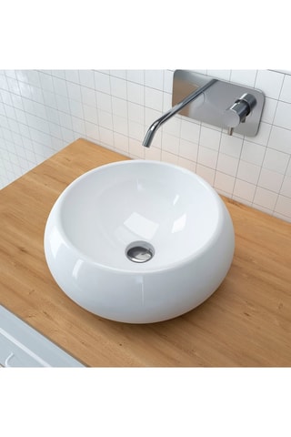 Vasque en céramique ronde à poser blanche