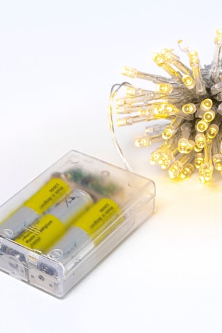 Décoration murale avec guirlande lumineuse - Doré