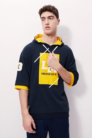 Sweat à capuche - 
Bleu marine et jaune