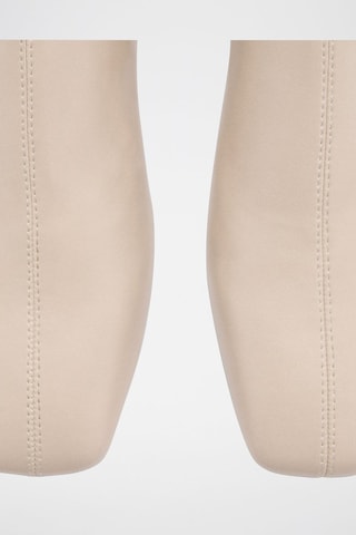 Bottes hautes zippées - Beige