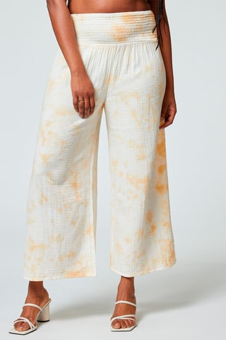 Calças palazzo tie and dye Djena Imp fundo branco