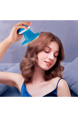 Peigne masseur vibrant électrique