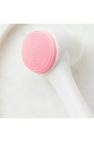Brosse double face multifonction pour le visage