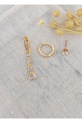 1 boucle d'oreille pendante, 1 puce et 1 créole dorées à l'or fin jaune - Zircons
