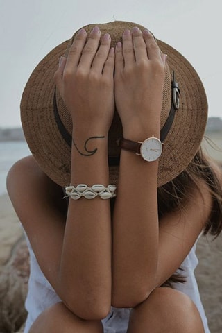 Montre à quartz en cuir et plaqué or rose Petite Bristol