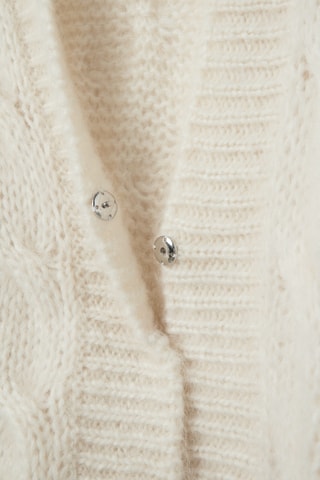 Casaco de malha em lã mérino - Cru