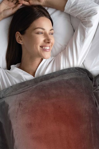 Poncho aquecedor 
Cinzento