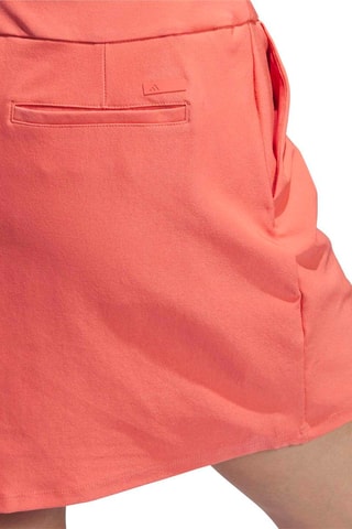 Golfrok Ult C Skt- Koraalrood