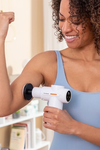 Pistola de massagem muscular