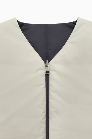 Colete reversível - Preto e bege