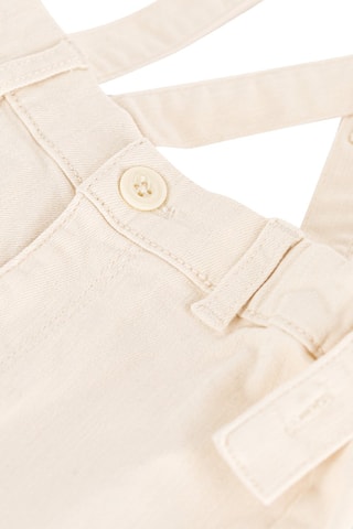 Salopette-short. Beige