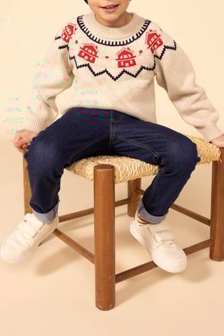 Pull en laine mélangée à manches longues. 
Beige