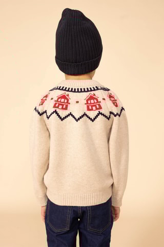 Pull en laine mélangée à manches longues. 
Beige