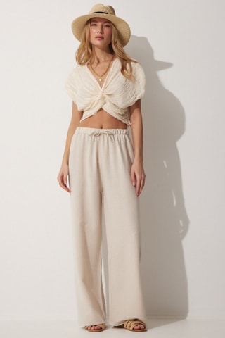 Calças wide legs em linho - Creme