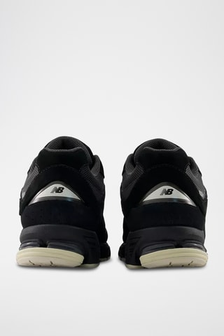 Sneakers in pelle scamosciata e mesh U2002 - Nero