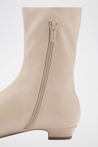 Bottes hautes zippées - Beige