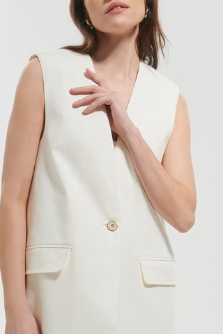 Casaco de lã virgem sem mangas - Cru