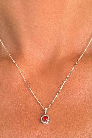 Pendentif - Or blanc, topazes et rubis