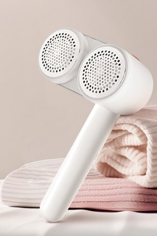 Appareil à double tête anti-peluches