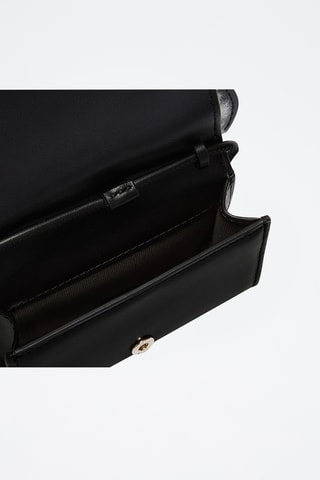 Sac bandoulière en fourrure d'agneau Allegra - Noir et blanc