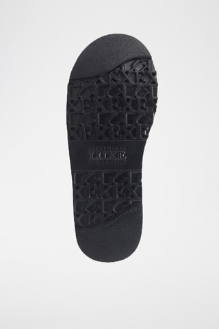 Pantoufles fourrées en cuir de mouton nubuck - Noir