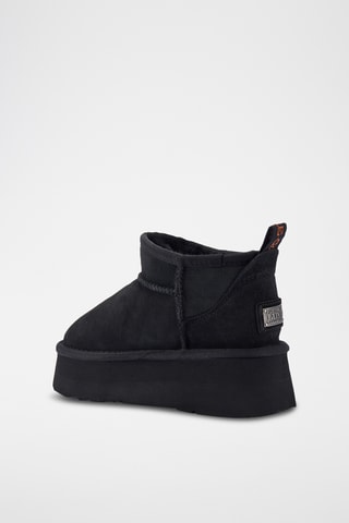 Bottines plateformes fourrées en cuir de mouton nubuck - Noir