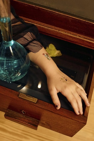 5 feuilles de tatouages éphémères - Noir et vert clair