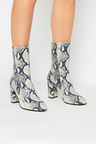 Bottines en cuir de mouton Fifer Pull On - Blanc et noir - Stuart Weitzman