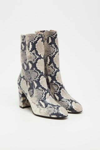 Bottines en cuir de mouton Fifer Pull On - Blanc et noir - Stuart Weitzman