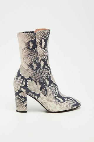 Bottines en cuir de mouton Fifer Pull On - Blanc et noir - Stuart Weitzman