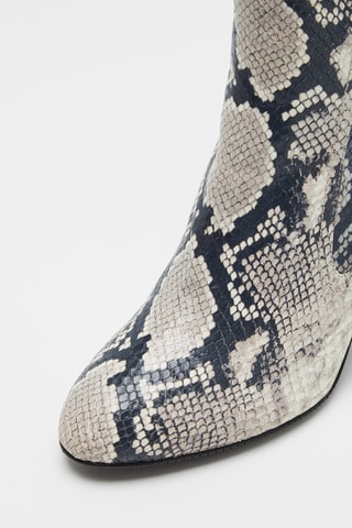 Bottines en cuir de mouton Fifer Pull On - Blanc et noir - Stuart Weitzman