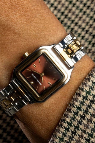 Reloj de cuarzo de acero y diamante