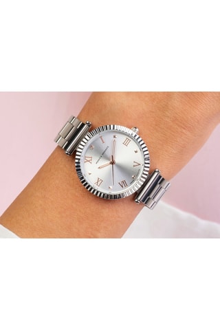 Reloj de cuarzo de acero y diamante