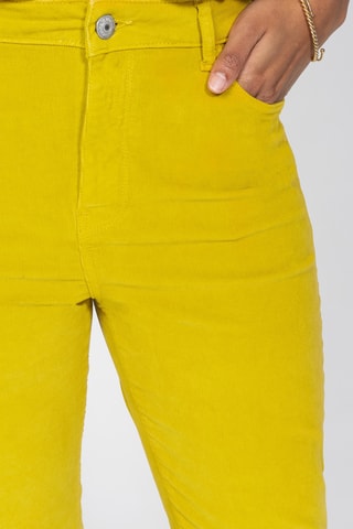 Calças slim de cintura alta - Mostarda