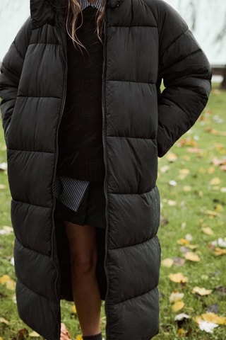 Gewatteerde jas met capuchon - Zwart
