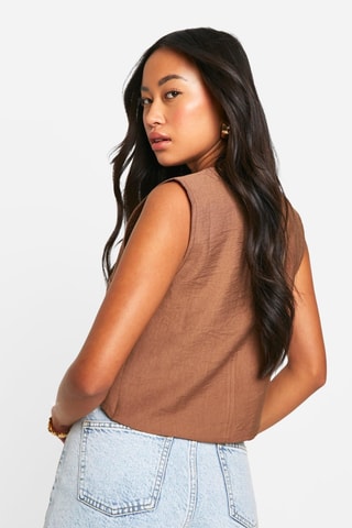 Colete de fato - Castanho