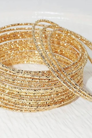 Conjunto de pulseras - Dorado