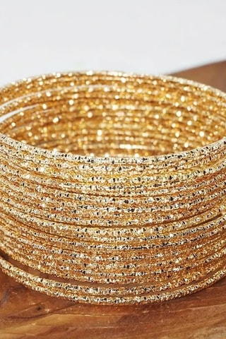 Conjunto de pulseras - Dorado