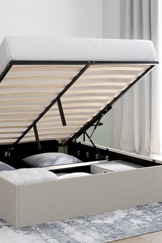 Lit coffre Louise en tissu beige avec sommier et tête de lit arrondie 140x190cm