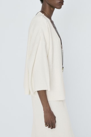 Pull cape en maille texturée à col en V - Blanc