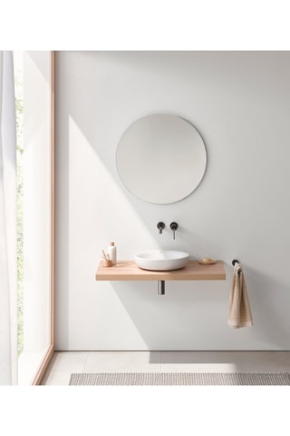 Lavabo redondo sobre encimera