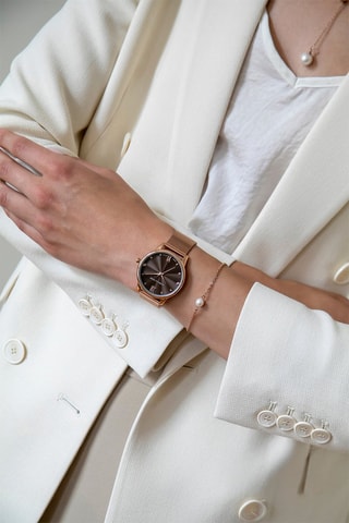 Coffret montre à quartz en acier, diamants et bracelet et perles fine Coco