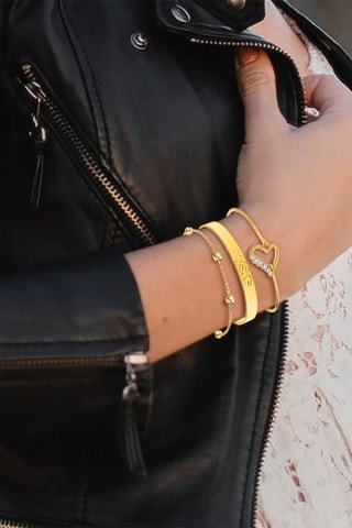 2 pulseiras rígidas e 1 pulseira banhada a ouro fino amarelo