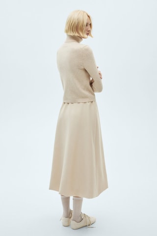 Pull-over à col roulé - Ecru