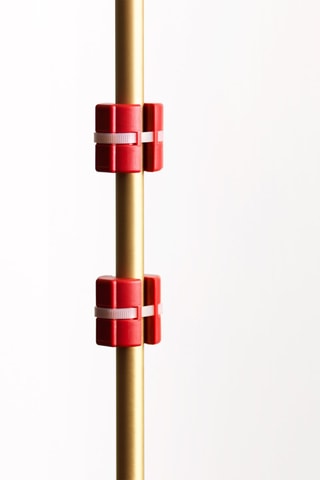 Dispositivo antical para cañerías Rojo