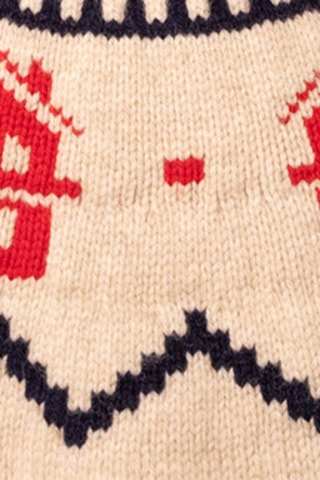 Pull en laine mélangée à manches longues. 
Beige