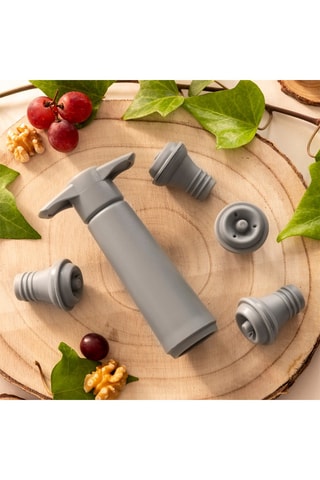 Cavatappi a pompa e 4 tappi da vino