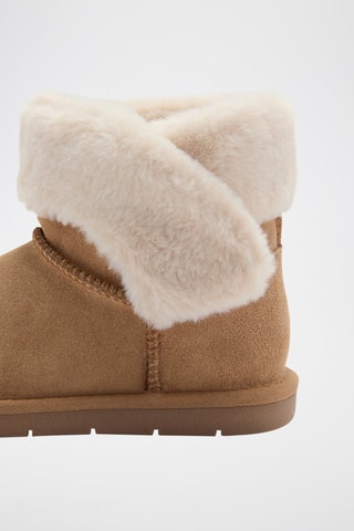 Bottines en cuir et fourrure - Beige