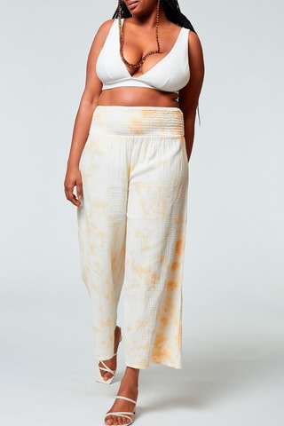 Calças palazzo tie and dye Djena Imp fundo branco