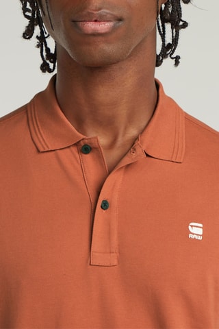 Polo slim em algodão biológico Dunda - Vermelho-tijolo